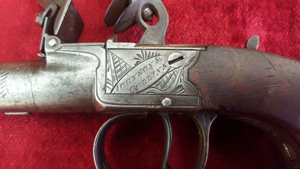 A good English flintlock pocket pistol manufactured by Johnson & Collins. Circa1800. Good condition. Ref 9401.